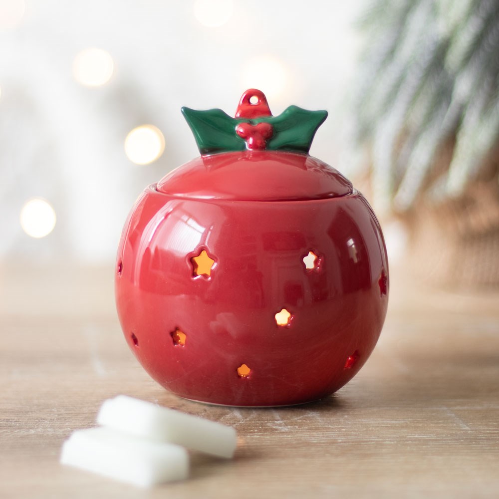 Brûle-parfum boule de Noël rouge aux étoiles ajourées, avec couvercle décoré de houx vert