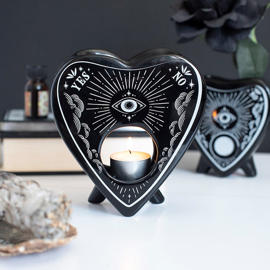 Brûle-parfum noir en forme de planchette avec œil rayonnant et motifs célestes blancs